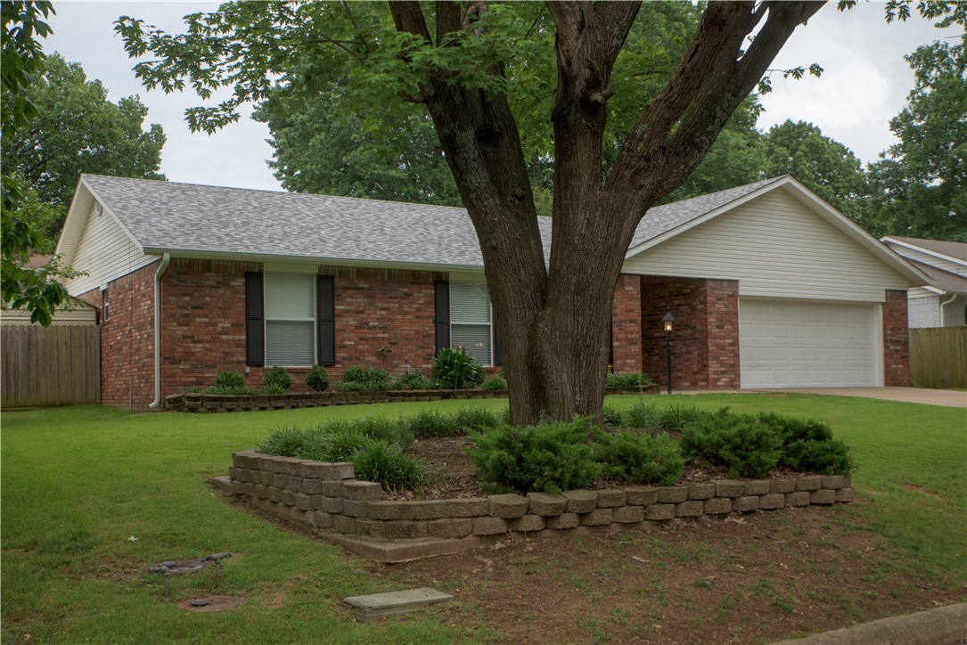 Welcome to 1443 Overo Circle, a charming single-family residence in Springdale, built in 1975. This home offers a unique opportunity to embrace comfortable living on a manageable 1639 square foot lot with mature trees.  With three spacious bedrooms and large open kitchen/living area with french doors to the covered outdoor patio, there is plenty of space for everyone.  New roof in 2025, new HVAC in 2020, fresh paint and newer appliances make this home truly move-in ready.  Direct access to the new trails at nearby JB Hunt Park!  Fantastic starter home or investment property.   Discover the potential of this Springdale residence and imagine the lifestyle it offers; contact us today for a private viewing.