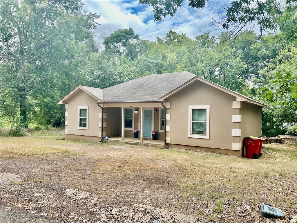 Check out this fully furnished 3 bed, 2 bath home built in 2017, located in a quiet neighborhood. With 1,330 sq ft, a large backyard, and circle drive, this charming property is move-in ready! Recent updates include attic insulation, fresh paint, new carpet in the living room & laundry, new shower fixtures, French drain, back porch railings, and a whole-house surge protector. Appliances (approx. 2 yrs old) includes stainless steel stove, refrigerator, built-in microwave, dishwasher, plus washer/dryer. Furniture negotiable. Outside features an old cement cellar with potential for a storm shelter or playhouse, and a filled-in well-perfect for a garden. Home is being sold AS IS. Schedule your showing today.