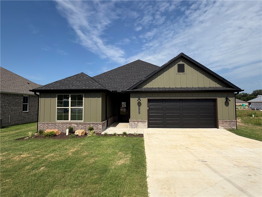 Welcome to The "Earl" Plan! This thoughtfully designed 1,685 sq. ft. single-level home offers the perfect blend of style, comfort, and functionality. The open-concept layout seamlessly connects the living, dining, and kitchen areas, creating an inviting space for everyday living and entertaining. The home features 3 spacious bedrooms, each with walk-in closets, 2 full bathrooms, a dedicated laundry room, and a 2-car garage. Enjoy quality finishes throughout, including Hardie siding with decorative wainscot accents, full gutters, LED disk lighting, ceiling fan and light kits in every bedroom, a large kitchen island with stylish pendant lighting, 3 cm granite countertops, a smart thermostat, and a premium Frigidaire Gallery appliance package. Conveniently located near schools, shopping, dining, and everyday amenities, The Earl Plan delivers modern living with exceptional value. RD-eligible and builder-preferred lender credit available!