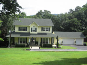 Sitting pretty on 3.04 acres there is no question this house was made for a family who loves to entertain.  Great pool with amazing outdoor snack bar, large game room, open kitchen, living and dining. Inviting covered porches and decks surround the house. Master suite downstairs and 3 bedrooms upstairs with private baths.  Exercise/sun room overlooks the pool.  Huge 3-car garage & 2 outbildings.