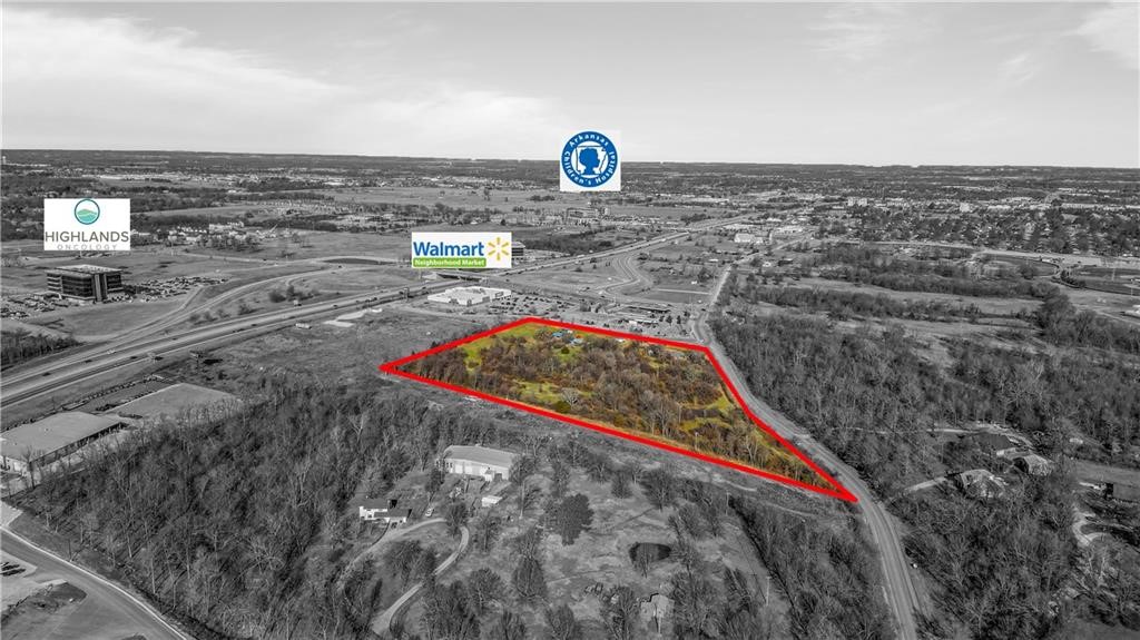 Amazing commercial land available for prime development opportunity. This 10.55 acres would be suitable for Commercial or multi family development. Conveniently located next to Walmart Neighborhood Market and Casey’s General Store with close proximity to Arkansas Children's Hospital, Arkansas Natural's Baseball, Sam's Club and several restaurants. Directly in between Fayetteville and Rogers, you’re right in the middle of the sought after NWA community Buyer will have access to the gravity sewer line to be installed along the western border. Buyer to confirm all items during due diligence period Also listed as commercial MLS# 1237442