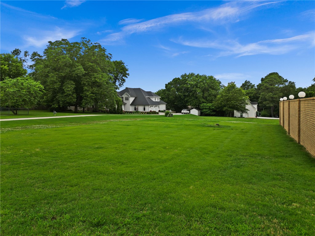 Rare find, .5 acre building lot in the heart of Fayetteville.  Within walking to distance to Wilson Park, and just a short bike ride to the University of Arkansas or historic downtown Fayetteville Square. Iron fencing will be removed at front of lot.  Survey attached to mls.