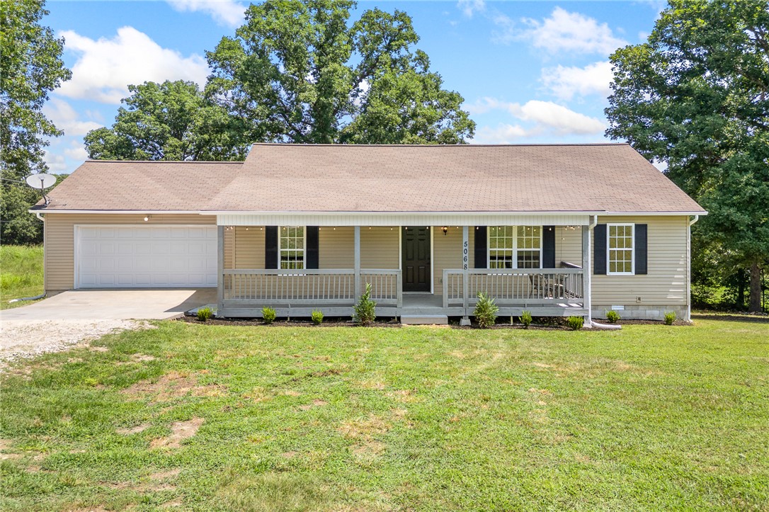 This is exactly what you've been looking for—and waiting to hit the market! This clean, cute 3-bedroom, 2-bath home sits on 0.80 m/l acres just a few miles north of Harrison, giving you the best of both worlds...a little room to breathe outside of town, but not too far from everything you need. It's fresh in all the right ways, move-in ready, and has a killer garage with plenty of space for vehicles, projects, storage, or all of the above. If you've been searching for a place with space, convenience, and value, this one deserves a look! *More acreage available for additional cost. Total lot size is 2.24 m/l acres.