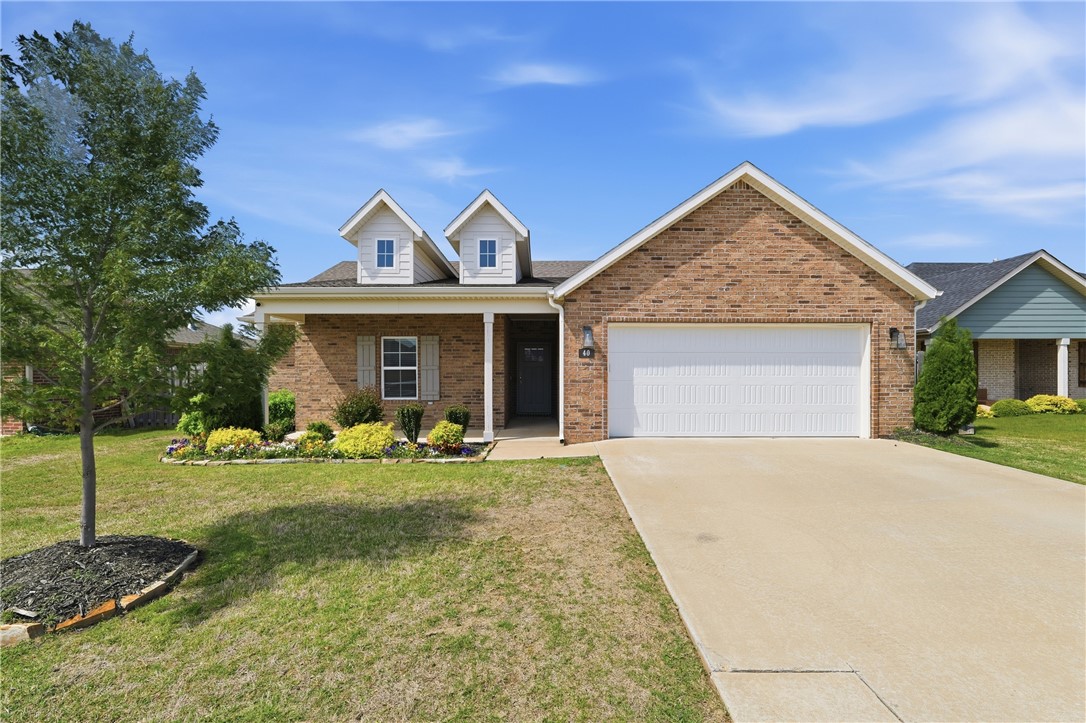 Welcome to this beautiful 2021-built home in a desirable subdivision. This home offers an open-concept layout, high ceilings, and abundant natural light. The spacious living room features a cozy gas fireplace and flows seamlessly into the kitchen with granite countertops, stainless steel appliances, gas range, tile backsplash, and a large bar for seating. The split floor plan provides privacy, with a comfortable primary suite and well-sized secondary bedrooms.