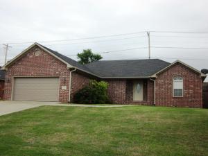 3 Bedroom, 2 Bath home in growing neighborhood is a great starter home with the washer, dryer and refrigerator included!!! This home also features trey ceilings, large master bath, covered patio and privacy fenced yard.  Ease of maintenance with brick and vinyl siding, and wood and tile flooring in common areas.  Master bath features whirlpool tub and separate walk-in shower.