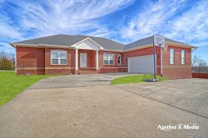 Need more Room?  This one has it inside and out.  The first thing you will notice it the huge living room and formal dining room.  Both offer access to a kitchen that is very well laid out.  There is breakfast area with a view of the back yard you will love as well.  If a split floor plan is what you need it also has that.  Lastly the master bedroom, bath and closet are super spacious.  Love!!