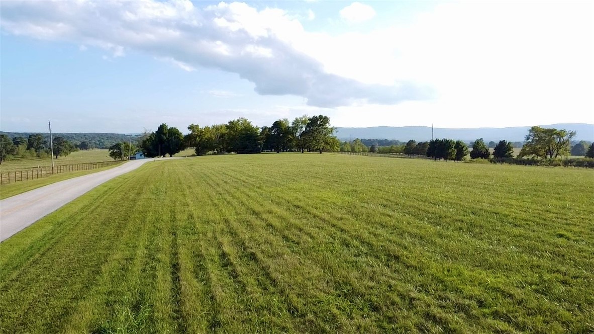 Estate Living! 10.99 acre parcel with a pond, fronting Valley View Church Rd. Rolling building site. Rural Water & Natural Gas Available.  Just 45 minutes south of Branson MO and just 25 minutes to Pruitt Access on the Buffalo River.  Harrison School District. 
Deed Restrictions - No Commercial poultry, hog, livestock, & no kennels of any kind. No mobile or modular homes. Tracts cannot be subdivided into two or more tracts.  Only single family residence per tract.