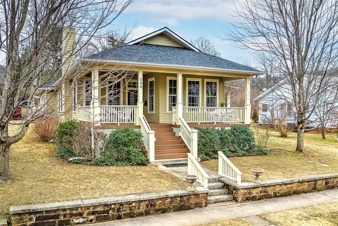 Here it is!  A newer gem in Fayetteville’s Historic District.  New construction in 2013.  This home has it all:  Corner lot, beautiful custom finishes and flooring, two bedrooms on main level, and even a FEMA-approved Storm shelter/safe room.  Built for entertaining, you won’t believe the large open living area and kitchen!  Soapstone countertops in kitchen, as well as an oversized butcher-block island with pro-style gas cooktop.  Marble flooring in downstairs bathrooms, and Crema Marfil Marble countertops in all three bathrooms.  Custom wide doorways and hallways.  Roof new in 2020, two HVAC units- upstairs unit also new in 2020.  Homes like this don’t come around very often!