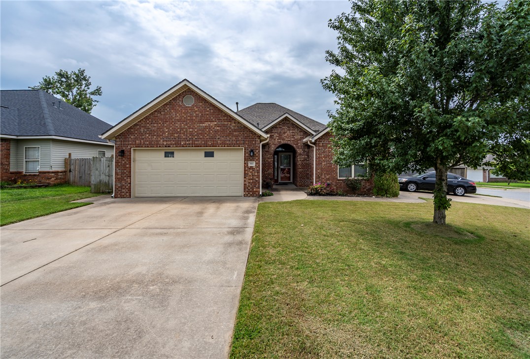 Charming 1812 sq ft, 3 bedrooms; Main bedroom with extra large walk in closet , and walk in shower/ jacuzzi tub.  Living room with vaulted ceilings and crown molding adding a special touch, and a gas log fireplace for cozy! Open to the formal dining room, kitchen with plenty of cabinets , easy pull out drawers and a corner lazy susan for the baker (s) in the family. Pantry!  Gas kitchen stove,with griddle in the middle  Lots of counter space!  Breakfast area has double patio doors letting natural light in. Covered patio for morning coffee, crepe myrtles for your view.   2nd & 3rd bedrooms share a full size tub/shower bathroom. Tile flooring in the dining room and kitchen make for a quick cleanup. Wood flooring in the living room. Soft plush carpet for the bedrooms. Attached 2 car garage with inset shelving for storage. Extra long driveway to garage, and  extra concrete parking on the side. Landscaped front and back.  Public Open House Sunday July 26... 1 to 3 pm. Colors are more vibrant in person.Come by ,lets talk