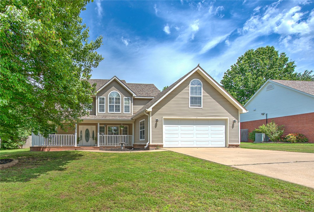 More space than most homes nearby—this corner-lot Centerton home offers a main-level primary suite plus a large bonus room upstairs and is conveniently located near Bentonville West High School (BWHS) and Centerton Gamble Elementary. The primary suite features an ensuite bath with soaker tub, separate shower, and double vanity. The bright kitchen offers Corian countertops, craftsman cherry cabinetry, soft-close drawers, pull-out shelving, and a pop-up outlet. Enjoy a cozy living room with gas log fireplace and sliding doors to the privacy-fenced backyard. Upstairs includes three additional bedrooms plus the bonus room—ideal for an office, gym, playroom, or second living area. Exceptional storage throughout includes multiple closets, a storage room off the bonus room, and additional attic access. Recent updates include a new roof (2020), garage door (2021), and tankless water heater (Oct 2025).