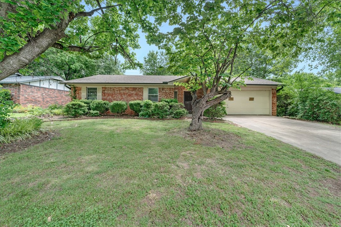 Charming remodel opportunity in a highly desirable location. Walk to Lake Fayetteville Trailhead and the Razorback Greenway. Fenced backyard with concrete patio and mature hardwoods. Spacious floor plan with kitchen open to the living room. Attractive brick exterior with new roof installed within last three years. Raised garden bed and existing blackberry bushes are ready for your green thumb. Needs interior remodel. Easy access to highway 71B, highway 265, Springdale Country Club, and surrounding dining & entertainment. Springdale school district. Priced to accommodate a large remodel budget.