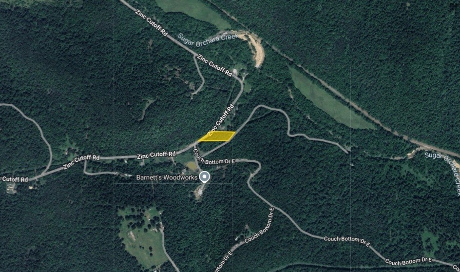 This is a 1.26 (+/-) acre lot in the town of Zinc of Boone County. Build a new home or place a manufactured or mobile home. If you want to be away from the city life, this area is just for you! Owner financing is available. Property conveys a Limited Warranty Deed. Call or text for more information.