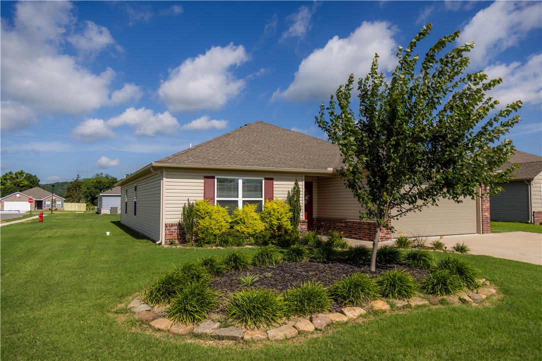 No time to wait in new construction, this turn key home is ready now!  2022-built, 3BR/2BA sits on a corner lot with a mature, established yard and landscaping that new construction can't match for years. No job site feel, no delays, just move-in ready today. Vaulted ceilings and wood-look flooring flow through an open-concept living, kitchen, and dining space with dark cabinetry, and stainless appliances. The primary suite offers a soaking tub, separate walk-in shower, dual vanity space, and a large walk-in closet. Brick-and-siding exterior and an extended driveway add to the curb appeal. This home quailfies for all loan types, has a new transferable warranty, and other options. Ideal for investors wanting immediate rent-readiness, retirees wanting low-maintenance one-story living, or families ready to settle in now instead of waiting on a builder's timeline.