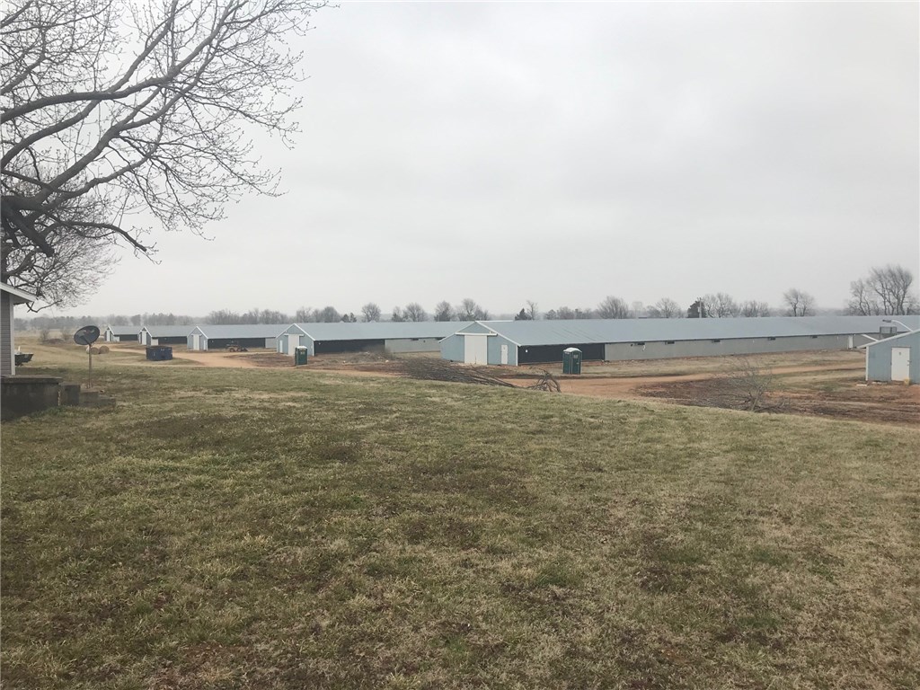 HARD TO FIND!!! Excellent location in Madison County right on Hwy 412, less than 20minutes away from Springdale or Huntsville! 6 PULLET  houses recently updated to integrator's specs in 2017. 3 BR, 1 BA country home recently remodeled, resting  on approximately 13 acres. Call or text me today and we will talk PULLETS!