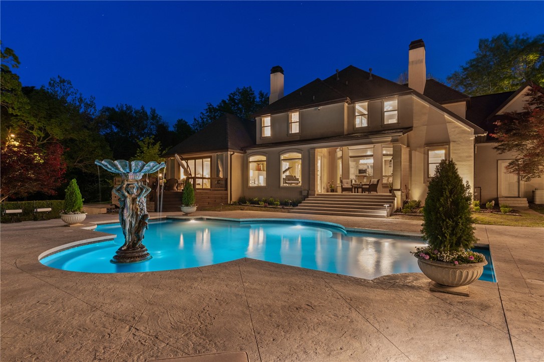 Stunning resort-style living at its finest. This exceptional estate offers the perfect blend of luxury, privacy, and thoughtful design, all set on 3.27 beautifully landscaped acres.

From the moment you arrive, you’re welcomed by a grand entrance with a striking fountain and meticulously maintained grounds that set the tone for this one-of-a-kind property. Inside, the home showcases exquisite craftsmanship with expansive marble flooring, custom lighting, and a dramatic custom iron staircase.

Designed for both everyday comfort and elevated entertaining, the home features a private office, media room, playroom, and a stunning sunken living room filled with natural light. 

Step outside to your own private retreat—complete with a resort-style pool, lush gardens, and serene creek frontage on two sides that meet at the back of the property, offering unmatched beauty and tranquility.

Entertainer’s dream, featuring a wine cellar, built-in keg tap to the movie room, and a fully equipped outdoor kitchen.