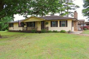 Wonderful home on 40 scenic acres with lovely mountain views!  This property has so much to love including a comfortable home that offers two large living areas, a sunny kitchen, 3 spacious bedrooms, 2 baths, and an abundance of storage!  Outside, you'll find a covered carport and even more storage.  There is beautiful pasture on both sides of the road as well as a very large barn for keeping equipment, animals, or whatever you may like!  Between the peaceful setting, the wonderful home, and the space, you'll never want to leave home!  Agents please read private remarks for important information.