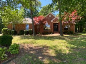CRISP & CLEAN AS THE BREEZE YOU'LL ENJOY SITTING ON YOUR BACK PATIO! This home has been well cared for. Open & Airy Living/Dining/Kitchen area. Beautiful Wood Burning Fireplace. Tiled Granite Counter tops with a sit-in Bar area. Large Master Bedroom boasting a Large Bath w/a whirlpool tub, double vanity & double closets. There is a gorgeous back patio featuring a nice outdoor fireplace! It's like a Retreat in your own back yard. There is a 30 x 40 Building with electric, concrete floors & a Roll up door. There is also a storm shelter.This home sits in a nice subdivision just minutes from town. This is a MUST SEE Home! There are very few on the market that offer this Quality &  Price. Call today to schedule your appointment.