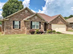 Stunning home in one of Russellville's loveliest neighborhoods on the edge of town!  This beautiful home offers a large living room with hardwood floors.  The kitchen and dining area are the perfect setting for entertaining and spending family time!  There is a private office area and an elegant master suite with a large closet, garden tub, and walk in shower!  Outside you'll find a large fenced yard perfect for playtime or just relaxing with friends!