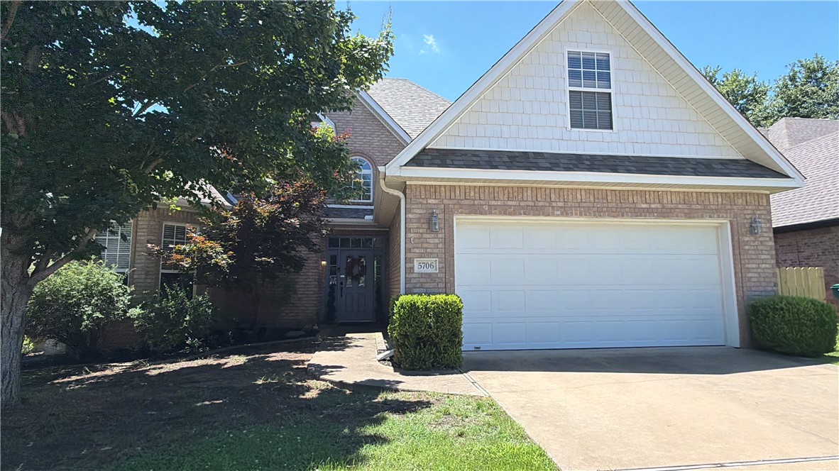 Amazing location in Rogers — just minutes from the WM home office, Promenade shopping, and easy highway access. This all-brick home with vinyl accent sits in established Stoney Creek Place subdivision and offers 3 bedrooms, 2.5 baths, and 2,315 sq ft of comfortable living space across two levels. Featuring a huge primary suite, bonus room upstairs, extended deck, and storage building out back. The sellers have invested heavily in updates: hardwood floors and granite countertops (2018), and a full refresh in 2024 including new flooring in the kitchen, dining room, and primary bath, all-new carpet throughout, fresh interior paint, painted kitchen and primary bath cabinets, new fireplace tile, and a brand new roof. Also features a new water heater, new HVAC, security system, washer/dryer connections, and walk-in closets. HOA covers maintenance. A truly move-in ready home with all the big-ticket items already done!