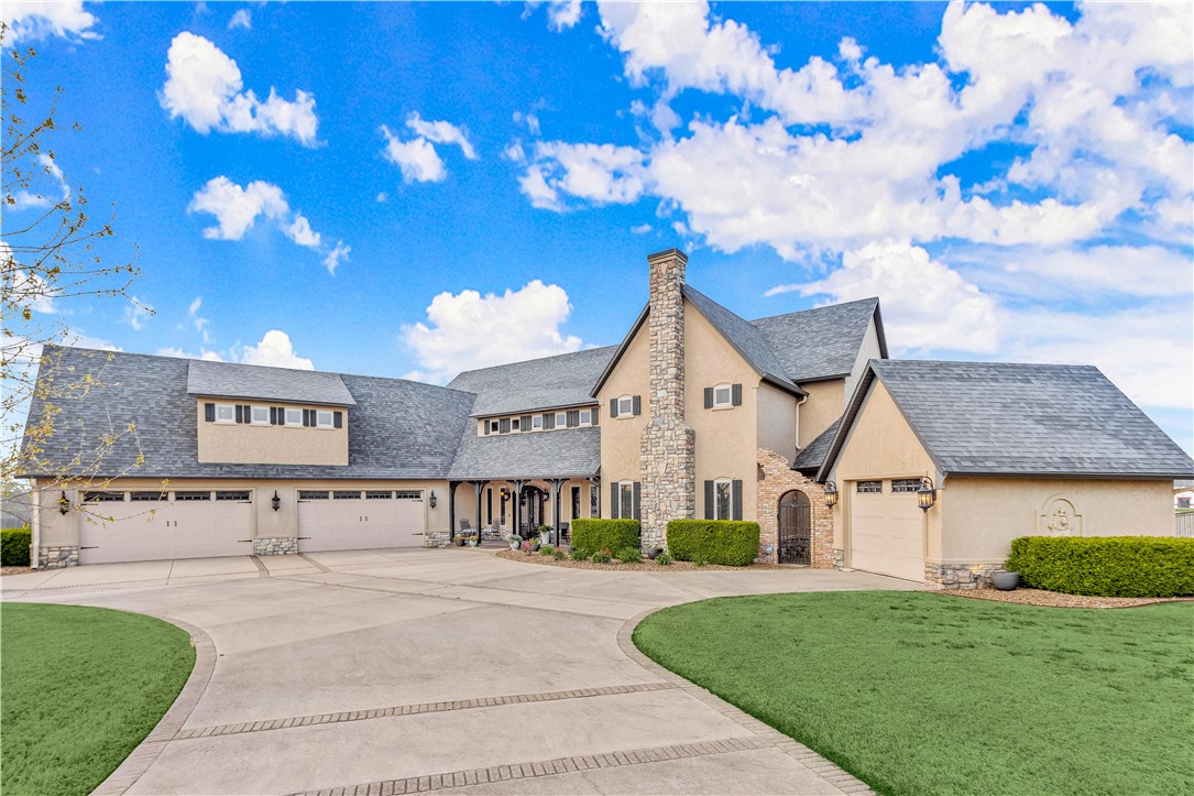 Nestled on flat 1.59 acres this custom built home is what you have been waiting for. This will be the home to entertain in with more than enough space for friends & family. The additional 1575 SQ FT two story pool house is plumbed for a kitchen & bathroom giving you the ability to create the perfect oasis. The 9.5 depth gunite pool offers waterfall features, sitting bench below & diving board. The outdoor space is complimented with a stone woodburning fireplace & sitting area. Enjoy the private secluded outdoor space for a hot tub right off the primary bedroom. Inside the home you are greeted with beautiful exposed brick accents that offer a warm feeling year around. Hard to find an office, dining room, sunroom, bonus room & added flex space under one roof--but this one has it all! If you need room for cars, the attached 5 car garage is an added plus. Easy access to I-49 & Bentonville West HS nearby, you'll love the convenience. There is too much to mention, make sure you come by today to see it all for yourself.