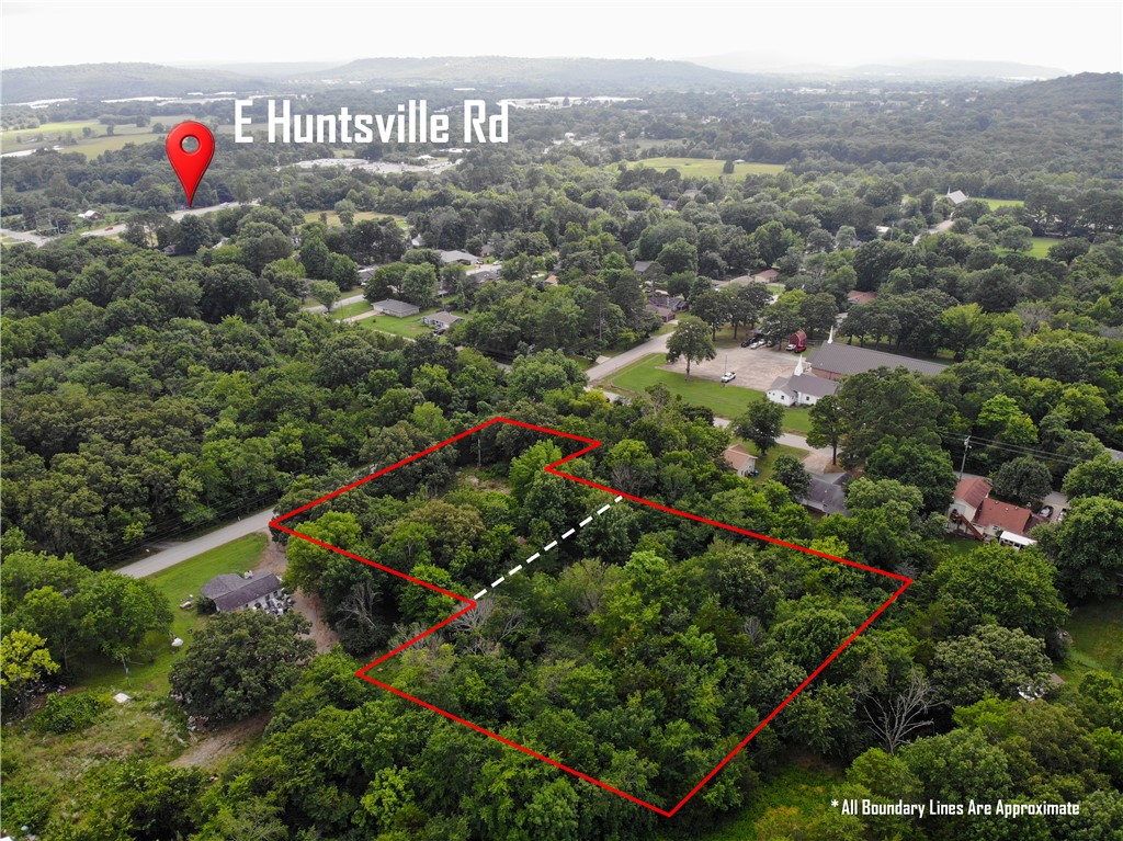 Fantastic double-parcel lot, 2.26 acres MOL in desirable East Fayetteville! Ready for your dream home with water and sewer available at the road. Conveniently located just minutes from I-49 and downtown Fayetteville, this property offers the perfect balance of accessibility and tranquility, providing a private, out-of-town feel without sacrificing convenience.
