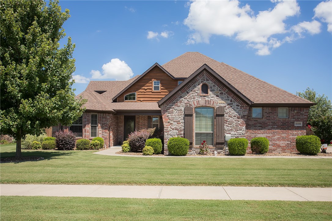 Looking for the ideal location for your next home?  Home is located behind the community center less than a 5 min walk there & trails.  Minutes from Walmart home office, Bentonville square & XNA. Kids can walk or bike to school.  Special features include built in speakers throughout the home & on patio, gas stove w/ pot filler.  Enjoy evenings on the back patio overlooking large yard w/ outdoor fireplace pond & waterfall.  Paved walkway from back door to side gate & oversized patio & seating areas.