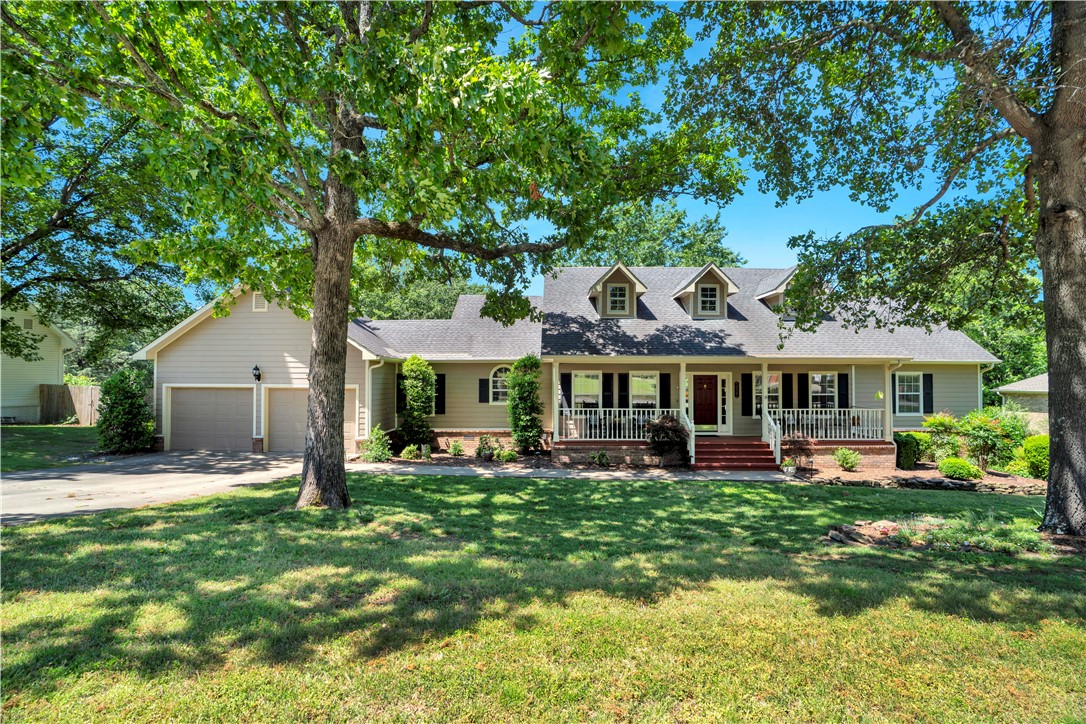 This elegant single-story residence is situated in the desirable Paradise Place neighborhood and features an exceptional floor plan. The home offers spacious rooms with four bedrooms and three bathrooms, including a bedroom and bathroom conveniently located adjacent to the kitchen and casual dining area. Hardwood flooring enhances the living room, formal dining room, and primary bedroom. The living room also includes a fireplace and direct access to a generous rear deck. The kitchen provides ample cabinetry, quartz countertops, tile flooring, and connects seamlessly to the casual dining space. The backyard offers mature trees and generous space for outdoor activities or entertaining, with potential for a pool. This beautifully maintained and tastefully decorated home exemplifies comfort and style.
