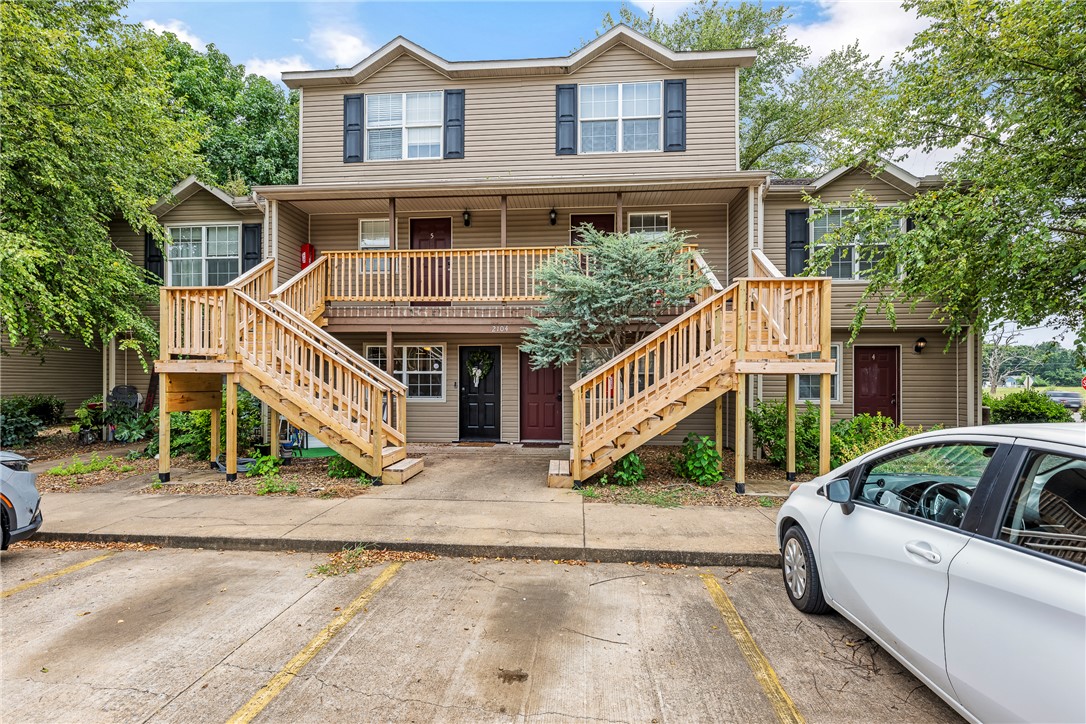 Near UA campus! Dont miss this fantastic opportunity to own housing  for your student, investment, or your personal game-day place. This completely remodeled ground level condominium in established Bradford Place complex is just steps from Razorback transit stop and Razorback greenway with easy I-49 access. A complete renovation in 2025 includes new LVP flooring, electrical upgrades, drywall ceilings, fully remodeled kitchen and bathroom, new appliances, water heater and air, and lighting. All appliances convey. POA provides all exterior maintenance, water, trash, residents only  pool, and grounds. This adorable condo is completely turn key and ready for new owner! Showings begin at noon on Tuesday, July 28th.
