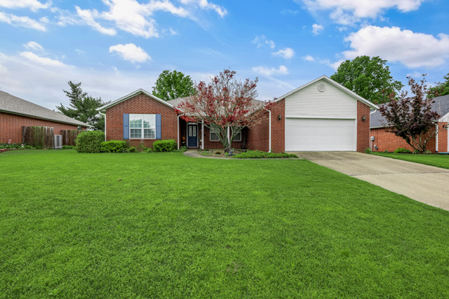 Welcome home to this immaculate, traditional all-brick residence located in the highly desirable Peaceful Valley Estates subdivision of Springdale. Offering 4 bedrooms and 2 full bathrooms across a generous 2,083 square feet, this single-story home features a functional split-bedroom floor plan designed for maximum privacy and comfort. Inviting Living Spaces: A massive, light-filled family room serves as the heart of the home, complete with a cozy gas-log fireplace, custom double-pane vinyl windows, and elegant tile, wood and carpet flooring.Formal Dining: A dedicated formal dining space makes hosting holiday gatherings or intimate dinners effortless. The oversized primary suite is a true sanctuary, featuring a massive walk-in closet, a whirlpool tub for ultimate relaxation, and a private patio entrance to enjoy peaceful morning coffee. Seller holds a active Real Estate license in the State of Oklahoma.