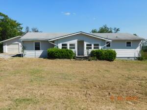 Spacious Home plus Huge 24 X 48 ft garage or shop building. Office could be used for 4th bedroom, Located in Lead Hill near public school, grocery/convenience store, post office, medical clinic, and only about 3 miles to Bull Shoals Lake public dock and marina, famous for bass fishing and water sports. Home needs repairs & updates including central air unit is missing, furnace and water heater are not functional, shower in main bath has been removed, etc. Actual age is unknown, sq ftg, lot size, acreage, etc, are from public records. Property sold As Is, no repairs before closing. Seller requires written verification of cash available or loan pre-approval with offer, be sure lender will loan on property in its current condition.