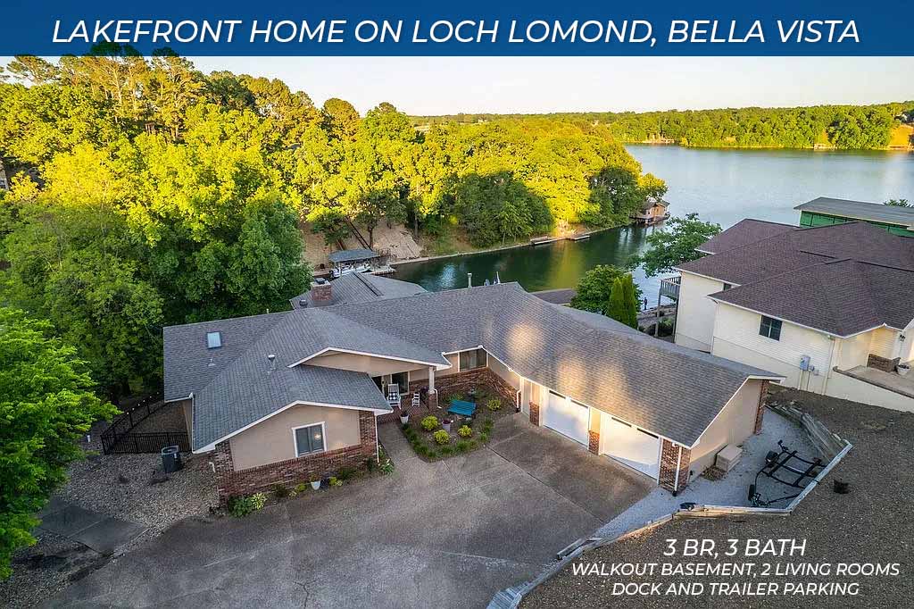 Experience lakefront living in this 3bd/3bath with breathtaking view of beautiful lake Lomond, generous living spaces, & premium amenities. Main level features inviting living room with fireplace, formal dining, wet bar, & sunroom showcasing panoramic lake views. The well equipped kitchen includes range, double oven, dishwasher, microwave, & disposal. The lower level offers a private bedroom & bath, spacious living area with cozy fireplace, second kitchen, & heated/cooled bonus room perfect for a home gym, office, or hobby space. Step outside to a large covered patio with 2 ceiling fans, creating the perfect setting for relaxation. Enjoy an easy stroll down to the covered boat slip, complete w/boat lift, moss back fishing structure around & under dock, an underwater dock light, everything you need to catch your limit from the comfort of your own private dock. Car enthusiast will appreciate the oversized two-car garage, offering ample space. Recently installed garage doors with ultra-quiet openers add value.