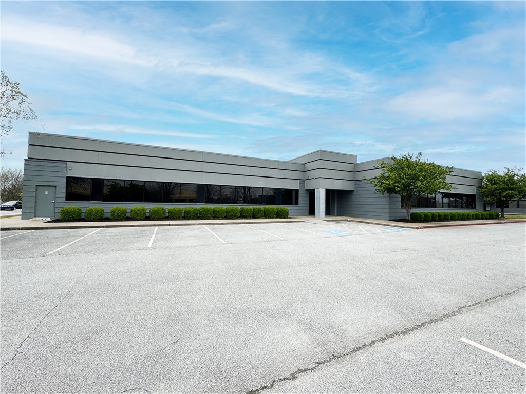 Discover an exceptional opportunity to own or lease a recently renovated 14,388 sq ft office building at 210 SE 34th Street in Bentonville. This modern space boasts 25 private offices, 7 conference rooms, and a fully equipped test kitchen, making it ideal for a diverse range of businesses. Flexible options are available, including the ability to divide the space or accommodate a single tenant. Building is also listed for lease (MLS #1276164).