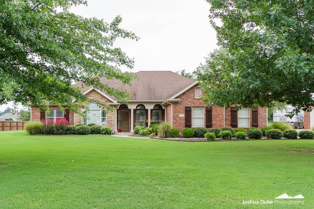 Quality one owner home on nearly 1 acre with shop building that has RV parking. This well maintained home is located in an established neighborhood near I-49. This perfect 3 bedroom 2 bath home won't last long. Make an appointment today.