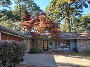 Wonderful Mid Century home sits on a large lot in Norristown subdivision just off Skyline Dr. Kitchen has been updated with a backsplash, paint, and refinished counter tops. Living room and master bedroom feature period grass cloth wall paper. Garage doubles as a woodwork shop and includes attic storage.  The property is sitting on a large lot with mature trees and extra landscaping.  The deck is great for grilling and entertaining.  There is a storage shed in the back with power that is in great condition. See documents for update details.