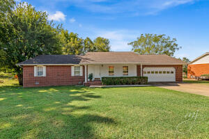 This 3/2 house features an open floor plan that encourages family time, while the back deck offers a place to relax with a cup of coffee.Large living room.  Separate utility room--washer and dryer convey with the sale. HVAC is 5 years old and still under warranty.  Current termite policy will transfer.  Call today for a showing appointment!