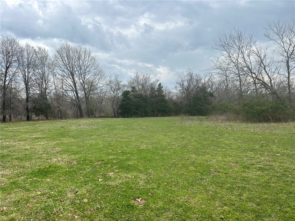 Check Out This Awesome Opportunity! This 41 acres has it all. Over 1,000 feet of Highway 72 Frontage! Over 1/4 of a mile of Bluebird road frontage! Only 1/4 of a mile from Interstate 49 on ramp! The location is prime for housing or commercial! Currently zone AG. This 41 acres has so much character from flat land up close to the highway, to gently rolling, and even some steeper on the south side that creates a natural privacy barrier. Perfect for one home or development! This land is a beautiful blank slate ready to be worked.
