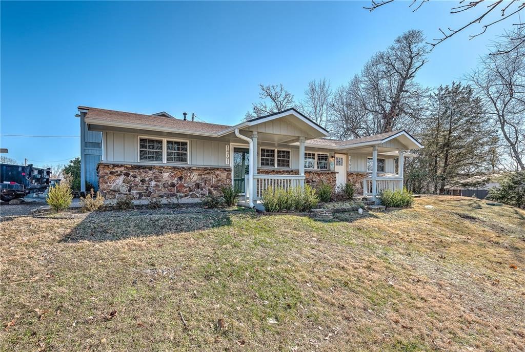 Rare rental opportunity near Beaver Lake: Newly renovated, 2 bedroom/2 bath unit on peaceful, private corner in the desirable Prairie Creek neighborhood. Spacious single story open floor plan with updated modern finishes and private, completely enclosed outdoor patio. All new wood-plank style flooring throughout with remodeled bathroom and kitchen, featuring stainless steel appliances. Full size in-unit washer and dryer. Expansive master suite with pitched ceilings, warm natural lighting, and private patio access. Minutes from Prairie Creek Marina, historic and rejuvenated downtown Rogers, and all the hiking, kayaking, boating and biking trails that the area has to offer! Country tranquility with in-town convenience. Available for immediate move-in. $1395/month w minimum one-year lease commitment. Water, sanitation and lawn care are all included. Security deposit same as first month's rent. Small pets subject to owner approval; additional pet deposit/fees apply.