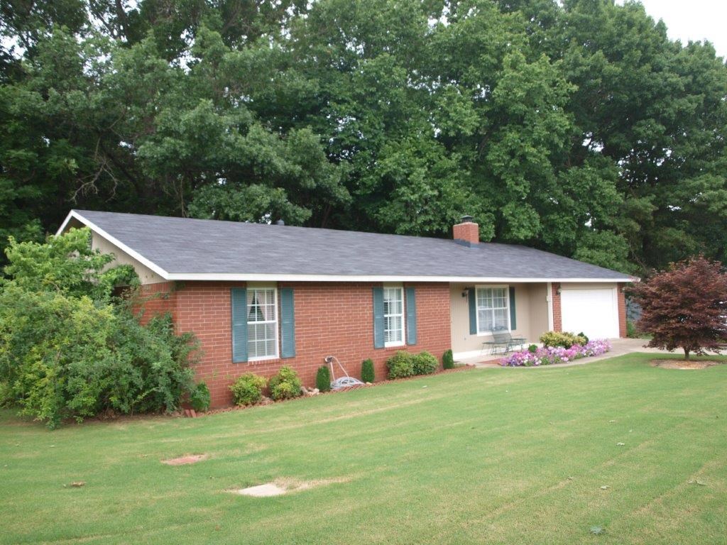 One owner all brick home- 3/2/2- Beautiful fireplace (carved mantel nego). Open kitchen with large dining area, wooded backyard, very private, small deck in back, large deck on side, very well cared for .66 acre yard. Ranch style home, SF off of appraisal. Non smoking, no pets & comes with home warranty.