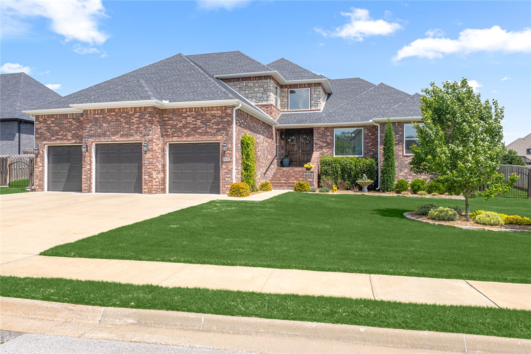 Enjoy all the pleasures of luxury and relaxation in this beautiful custom built home located in the heart of NW Arkansas Tuscany Subdivision less than five miles to I49 and Downtown Bentonville arts and entertainment district! Spend hot summer nights in oversized inground heated saltwater diving pool enjoying the fully landscaped views! Cool down, grill and entertain under the covered patio, and don't forget the access to outdoor full bathroom! Gather friends in the beautiful eat in kitchen with oversized pantry and island bar! And, there is no lack for storage in the amazing custom cabinets! Home also features primary bedroom with French door access to pool, large ensuite bathroom with deep soaker tub, walk-in shower, walk-around large closet to laundry and mud room. Private home office, formal dining room and upstairs floorplan offers bedroom, large closet, full bath and rec room with wet bar. Garage was custom built, plenty of space for big rigs, equipment and storage. You don't want to miss this!