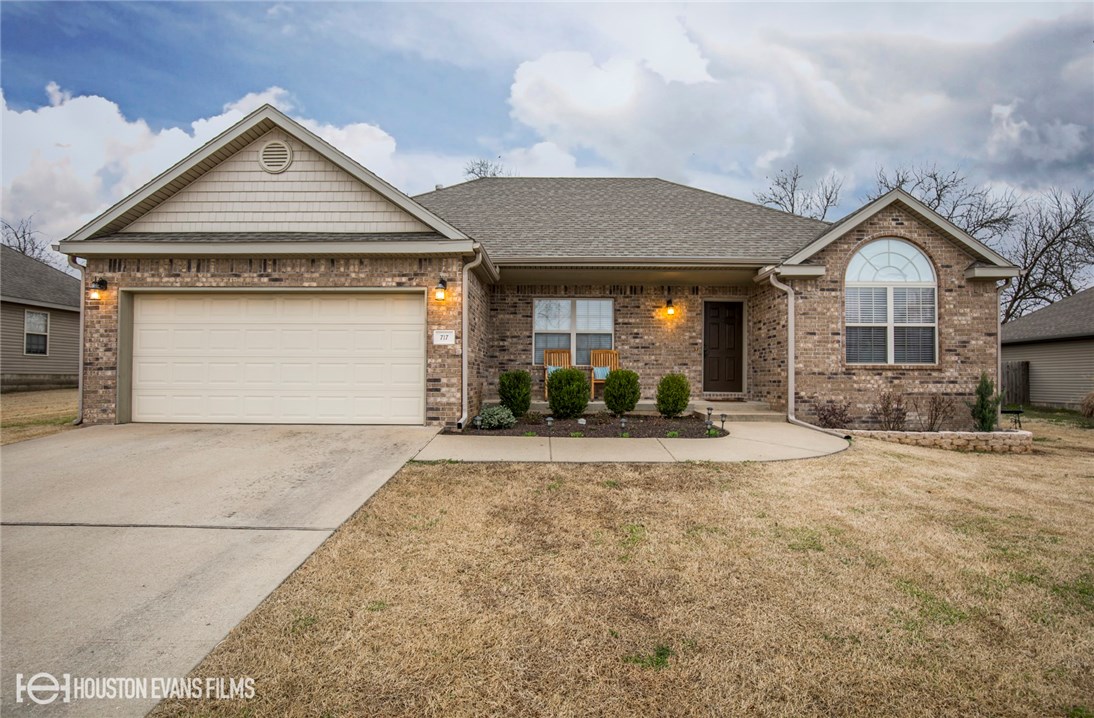 Great split floor plan home on a quiet dead-end street. Clean and move-in ready. Eat in kitchen with pantry. Hand-scraped wood floors installed 2017. HVAC less than 5 years old. Wired for surround sound. Covered back patio in the nice sized fenced backyard. Convenient to Bentonville and schools. Walk to the fishing pond in under 10 minutes. Such a great family home in a desirable neighborhood.