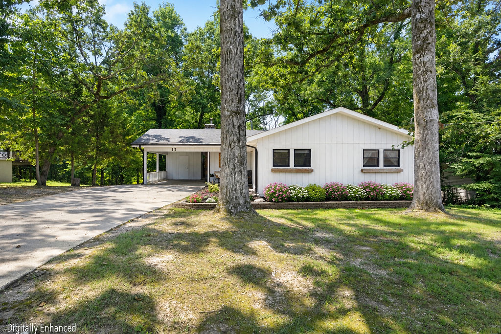 Move-in ready with quality updates throughout! The remodeled kitchen features granite countertops, a center island, and a pantry offering both style and functionality. The inviting living room showcases a floor-to-ceiling stone fireplace with a wood-burning stove creating a warm and welcoming focal point.

A spacious 8' x 28' sunroom, plumbed for a future gas heater, provides excellent flex space for relaxing, entertaining, or a home office. The fenced backyard is perfect for pets, play, or outdoor enjoyment, and the home is connected to public sewer for added convenience.

Major improvements include a newer HVAC system (2020), roof (2021), and exterior paint (2021), giving buyers added confidence. This well-maintained home offers the perfect blend of updated finishes, functional living space, and important mechanical improvements. Schedule your showing today!