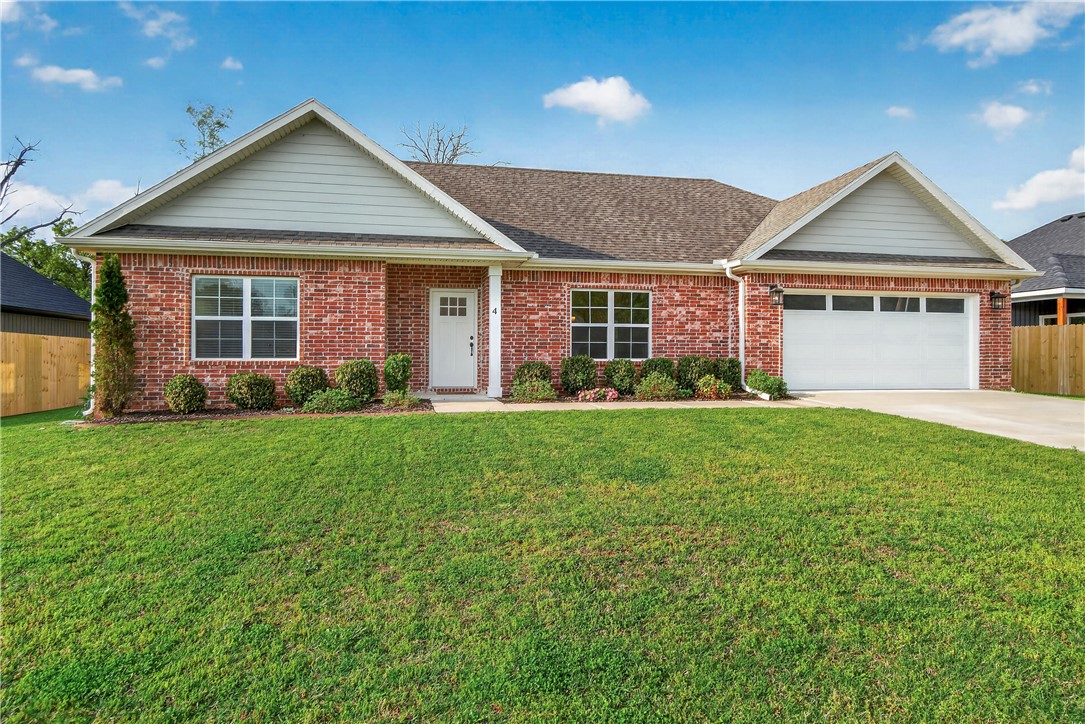 Located in the desirable Bella Vista community, this well-maintained 3-bedroom, 2-bath home offers 1,460
sq ft of thoughtfully designed living space and a rare, level backyard—ideal for entertaining, gardening, or
relaxing outdoors. Engineered wood flooring runs throughout most of the home, providing durability and
warmth. The dining area features a tasteful shiplap accent wall, while built-in bookshelves add both
character and functional storage. Fiber internet supports seamless remote work and streaming. The
primary suite includes a jetted tub for a spa-like retreat. Outdoor features include raised garden beds and
additional planting space. Conveniently located just minutes from Loch Lomond, the interstate, nearby
mountain biking trails, and approximately 20 minutes to Downtown Bentonville, offering a perfect blend of
comfort and accessibility.