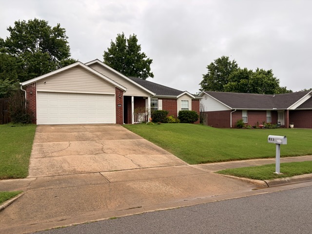Welcome home to this charming single-story residence located in an established Fayetteville neighborhood. Featuring attractive brick construction, a spacious two-car garage, and excellent curb appeal, this home offers comfortable living with a functional layout designed for everyday convenience.

Inside, you'll find great living spaces and plenty of room to relax or entertain. The well-maintained exterior includes a large, level yard perfect for outdoor activities, pets, or enjoying Arkansas evenings. Conveniently located near shopping, dining, schools, parks, and all that Fayetteville has to offer, this home provides easy access to major roads while maintaining a peaceful residential setting.