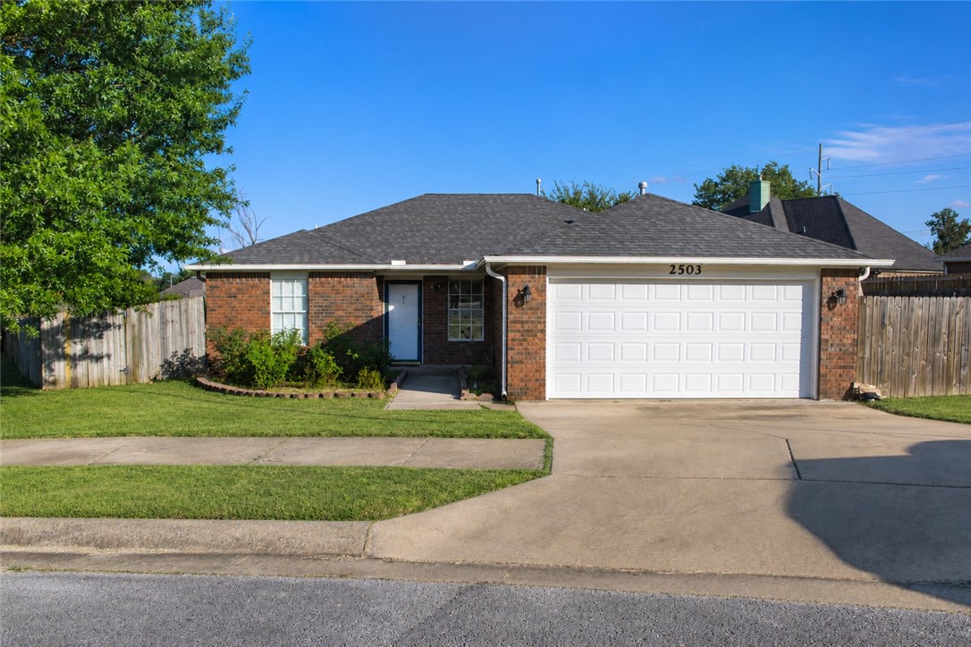 This property offers a spacious and functional floor plan designed for comfortable living.  Step outside to a fenced backyard, perfect for relaxing, entertaining, or enjoying time with pets. The attached 2-car garage provides convenient parking and additional storage. Situated in a quiet neighborhood, this home offers easy access to local schools, parks, and shopping while being just minutes from downtown Siloam Springs and Highway 412 for quick commutes.