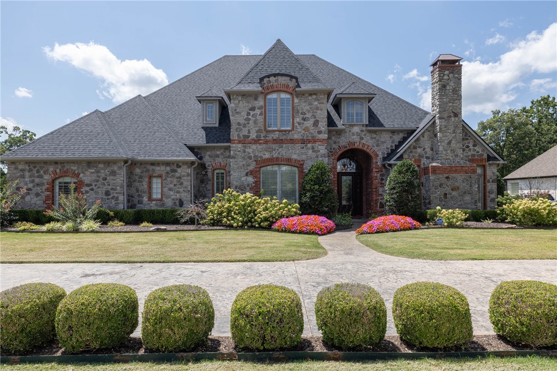 Nestled in the gated subdivision of Clear Creek, this stunning home offers beautiful details & custom built-ins throughout. Inside you’ll find two spacious living areas, formal living room & cozy hearth room off the kitchen. Gourmet kitchen features granite counters, stainless appliances, a center island, & a bar, complemented by a formal dining room. Primary suite boasts a large office, bath with double vanity, walk-in shower, & jetted tub. Upstairs, a versatile bonus area and three additional bedrooms await. Recent updates include new hardwood floors, fresh interior paint, modern lighting, & a new HVAC for the primary suite. The backyard is an entertainer’s dream, featuring a covered patio overlooking an inground gunite saltwater pool, outdoor fireplace, & professional landscaping. Garage is equipped with epoxy flooring, storage, & EV charger. With a new roof, chimney, & many upgrades, you can experience the perfect blend of elegance & modern convenience in this meticulously curated retreat.