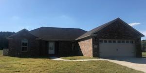 NEWLY CONSTRUCTED IN OVERLAND PARK--efficiency and design in mind in this new 3 BR, 2 BA brick home with hardwood flooring and granite countertops in kitchen and bathrooms.  Just over 1600 sq. ft., this split floor plan features a master suite with a well-designed master bath--whirlpool tub, walk-in shower, separate toilet, large walk-in closet and a linen closet! Check this one out today!