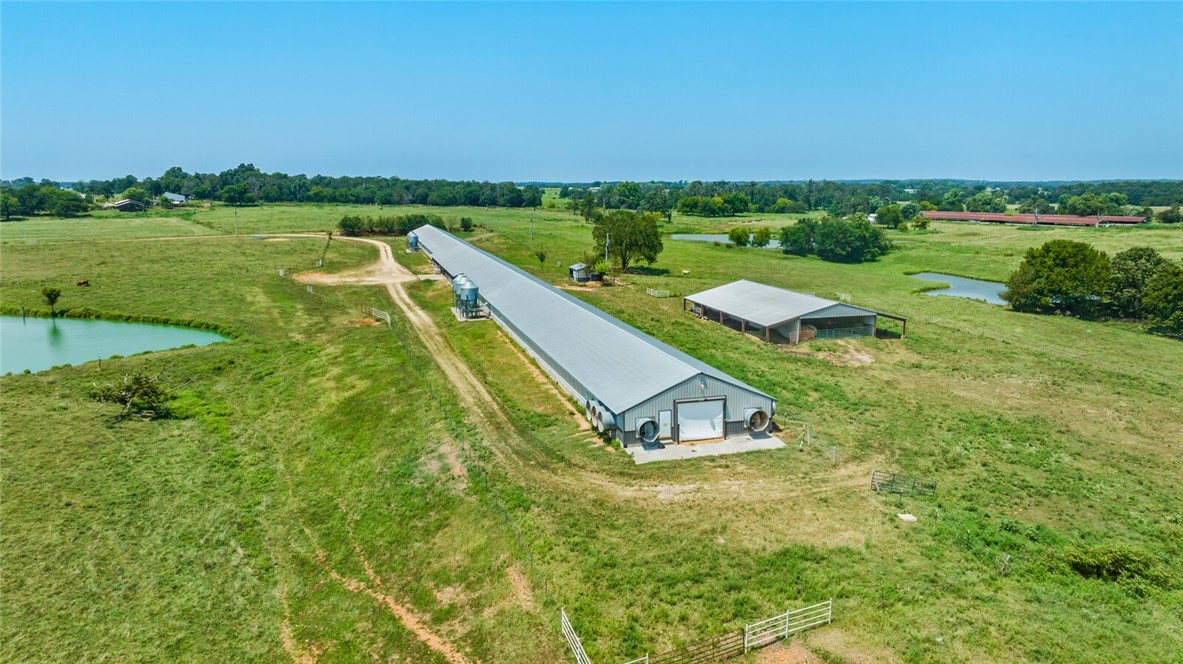 Are you looking to be your own boss and work from home? Here is your opportunity! NOT ONLY does it have work from home options, but it is also a prime location close to Bentonville and Gentry, NWA HUB!
Welcome to 12 ac mol with a home and 800 (2 poultry houses under 1 roof) with stick built home! Come grow some birds and live the life you dreamed of! COUNTRY! 3 bedroom/2 bath home and outbuilding.