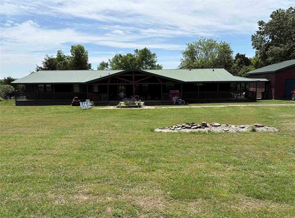 beautiful home on 3 acres fenced yard, large front porch detached garage, two living rooms, 3 bedroom two bathrooms, with a screened sunporch. plenty of room for family and the animals, come enjoy country living today.
