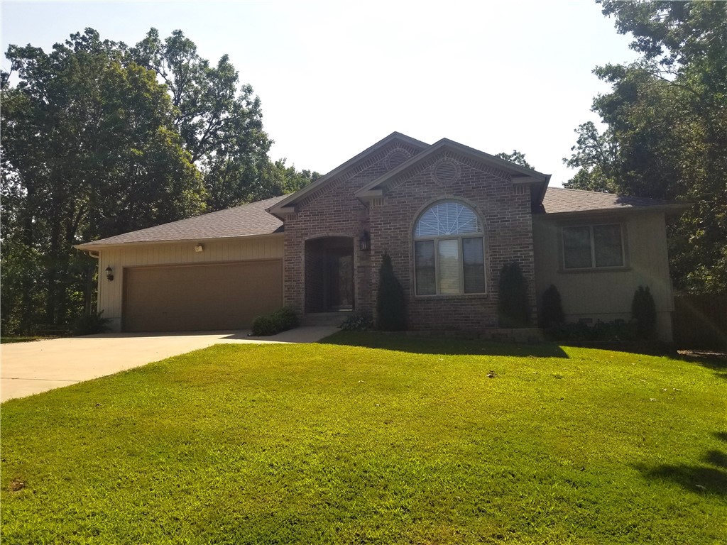 Looking for the perfect family home in Gravette School District? You've found it! This lovely home is situated on two lots so you have plenty of yard space to entertain. Back yard is mostly level and fenced. The living room has built-ins surrounding the fireplace. Fully equipped kitchen with granite counters and tons of storage. Large utility room with folding counter and cabinetry. Master with en suite bath offers his and hers walk in closets, dual vanities, whirlpool tub and separate walk in shower. Wonderful climate controlled sunroom overlooks back yard. Back yard has garden areas and storage shed! Easy drive to new bypass.