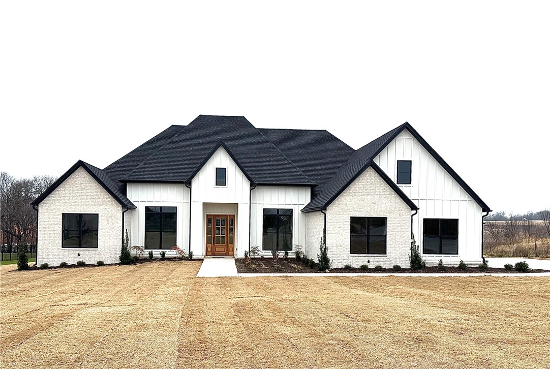 Dreaminess and Location in one home! This charming new construction home is right near the new by-pass exit on 412!  A large lot at 1.74 acres, this beautiful property offers 5 bedrooms plus an upgraded office, 3.5 baths, and 3553 sq ft of thoughtfully designed living space! Being at the end of the street it feels open and spacious.  As you enter the home you are met by a vast  vaulted wood ceiling! On your right the gourmet kitchen includes 10’ full-height custom cabinets, a natural gas range, large island, and exquisite attention to details. The primary suite offers a large soaking tub, tile shower, his/her vanities, and a large walk-in closet. From the central vacuum system to built ins- there are upgrades everywhere! The covered back porch is welcoming and open, perfect for enjoying the back yard. Come see this stunning home!
